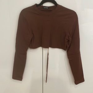 JACQUEMUS
Pino logo-charm cropped top